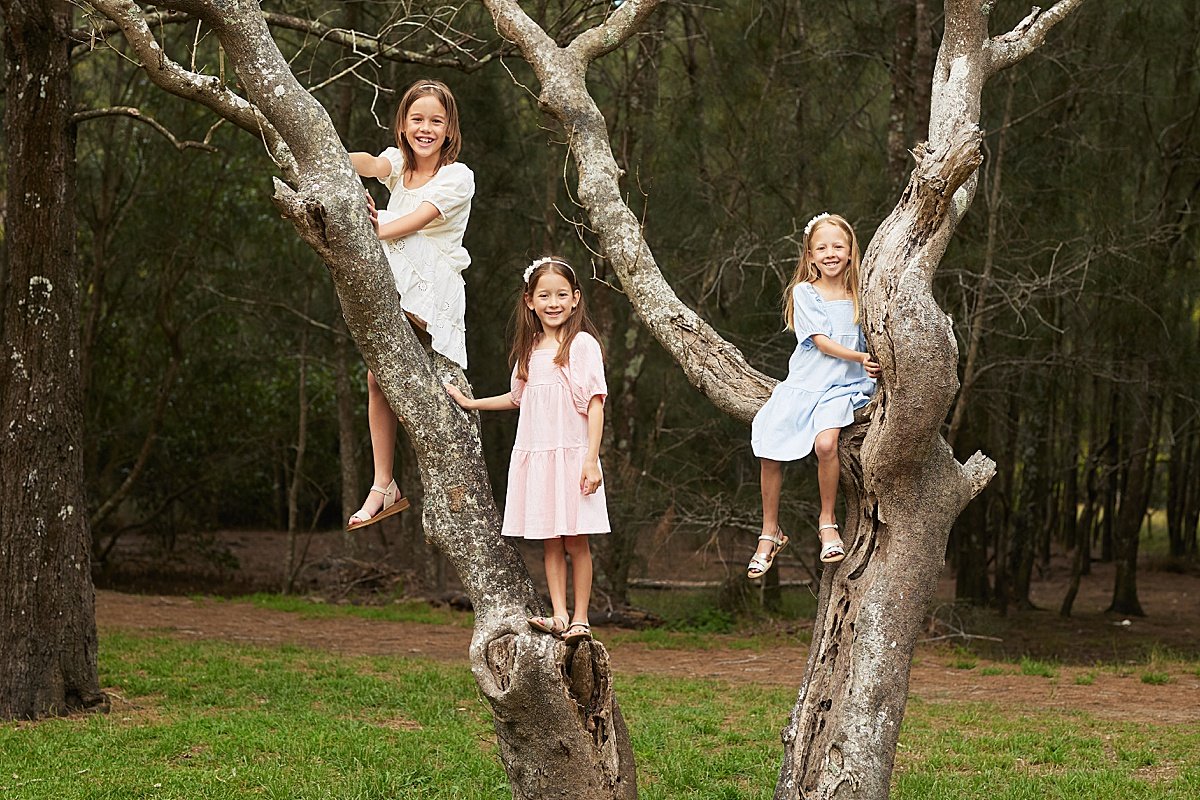 Outdoor park family portrait with 3 girls