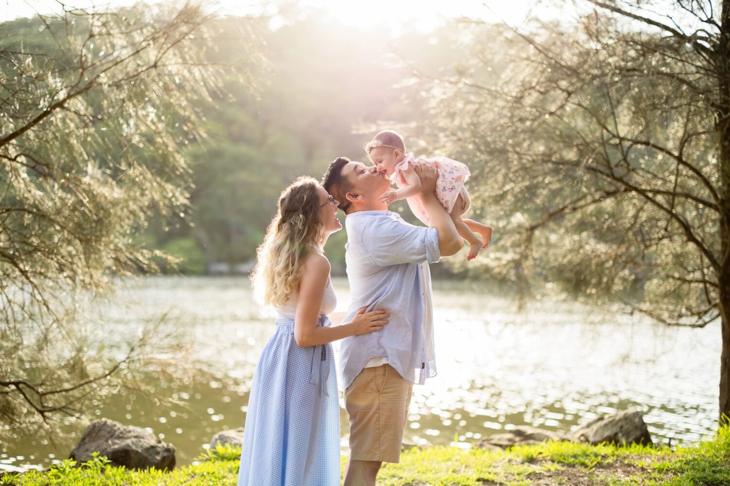 outdoor family portrait in park with young daughter