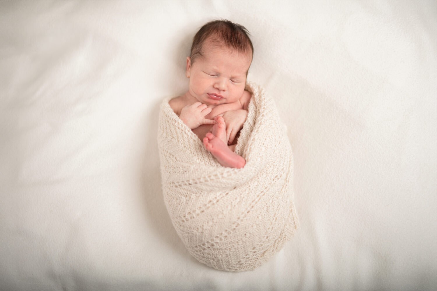 Newborn baby boy asleep