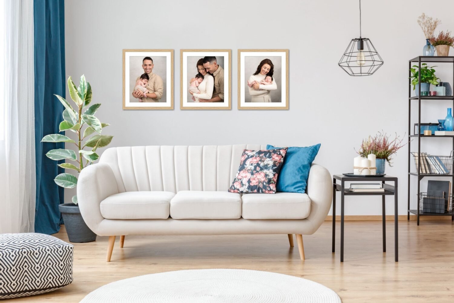 framed family portraits hanging on a modern living room wall